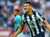 César Montes festeja un gol con Rayados en un partido de Liga MX.