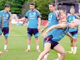FUTBOLISTAS ibéricos en su entrenamiento, ayer, en EU