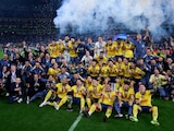 Jugadores del América celebran el tricampeonato de la Liga MX en el Apertura 2024.