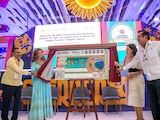 Autoridades de los tres niveles de gobierno encabezan la develación del billete de la Lotería Nacional conmemorativo a los 50 años del Tianguis Turístico.