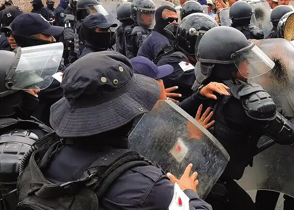 ASPECTOS de detenciones el sábado, en una protesta de productores de frijol.