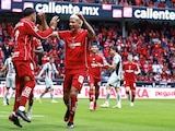 Alexis Vega celebrando su anotación ante el Atlas.