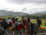 Migrantes centroaméricanos en su paso por Huixtla, Chiapas.