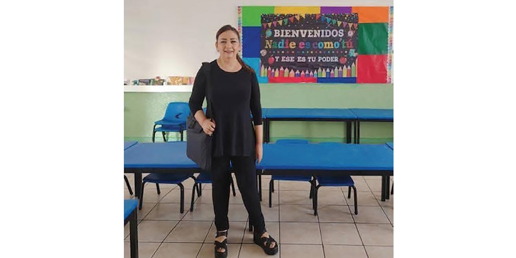 LA DIRIGENTE local, quien también laboraba como maestra en un kínder.