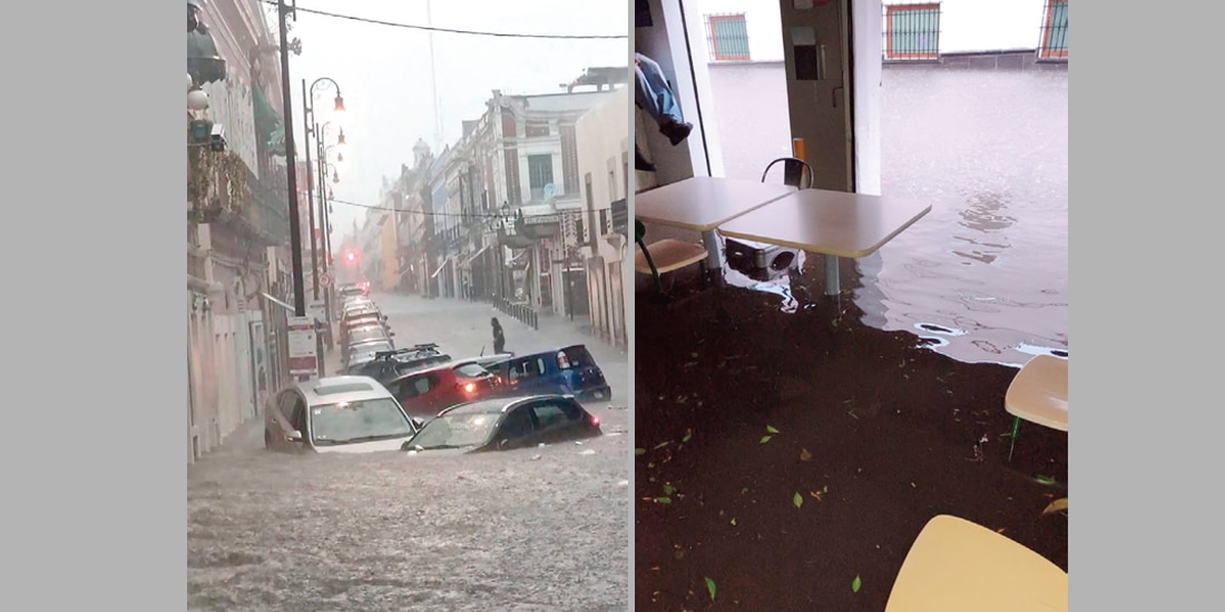 VEHÍCULOS SUMERGIDOS y negocios inundados en la ciudad, la tarde del domingo.