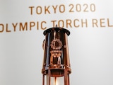 La llama de los Juegos Olímpicos en despliegue en el Museo Olímpico de Tokio.