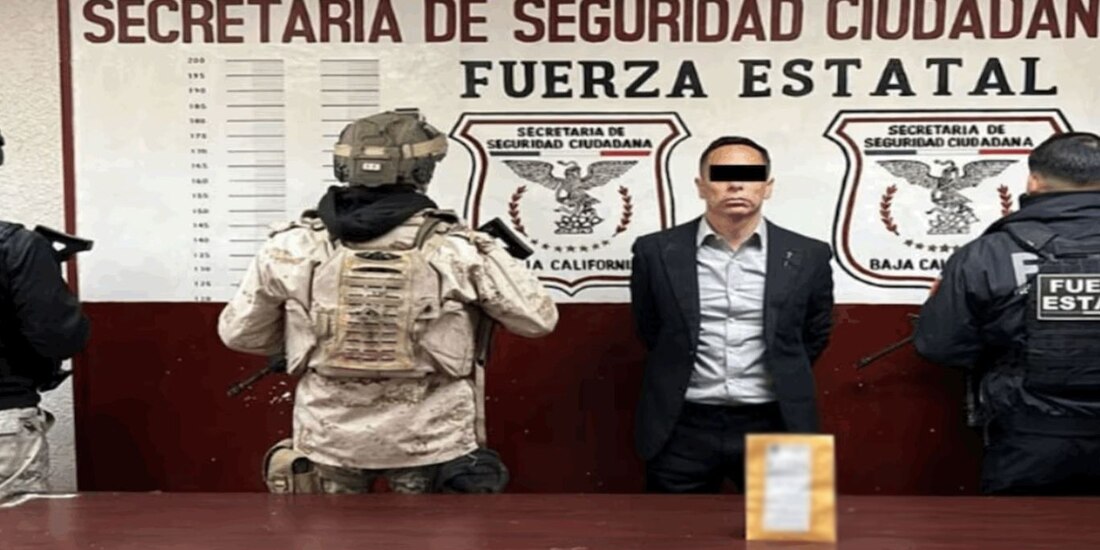 Elementos de las fuerzas de seguridad en el país haciendo la presentación de un presunto delincuente en BC.