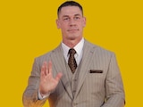John Cena durante su paso por la alfombra en el evento dedicado a los fans.