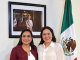 Ambas políticas en la reunión.
