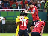 SURCOREANOS
festejan su
victoria en su
debut, ayer, en
Guadalajara