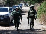 Labores de seguridad en la zona donde ocurrió el ataque con explosivos, en Jalisco.