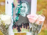Altar en memoria de la subdirectora de la Secundaria 13 en Torreón, el viernes.
