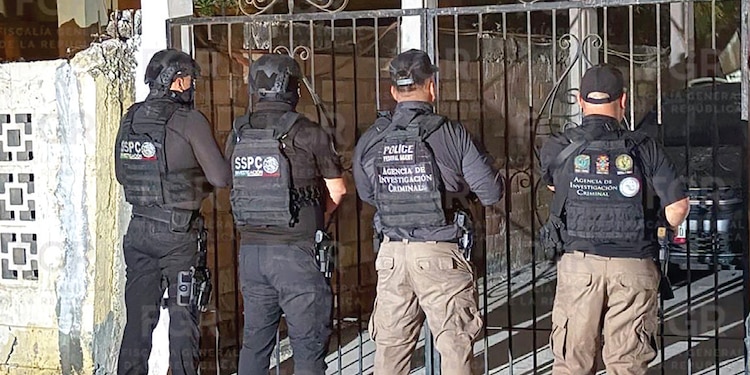 ELEMENTOS de seguridad, durante la diligencia en el municipio tamaulipeco