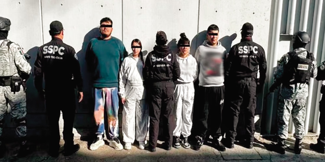 Elementos de la SSPC, al custodiar ayer a cuatro de los seis miembros de la organización Tren de Aragua detenidos.