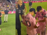 Un pequeño fan de Lionel Messi fue interceptado por el guardaespaldas del futbolista argentino.