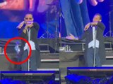 Marc Anthony pide aguardiente en un show... y le dan un botellazo (VIDEO)