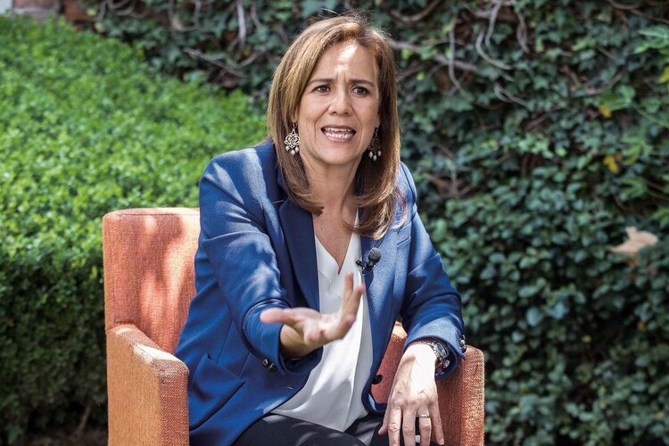 La exprimera dama en fotografía de archivo.