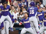 Peloteros venezolanos celebran su pase a la final del Mundial de Beisbol, ayer, en Estados Unidos.