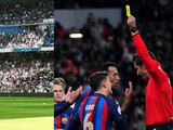 Aficionados del Real Madrid lanzaron cánticos contra el Barcelona durante su partido contra el Espanyol.