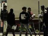 Un grupo de aproximadamente 100 migrantes deportado a México durante la noche