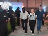 Momento de arresto de la implicada.