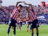 Hugo Camberos y Santiago Sandoval celebrando la anotación.