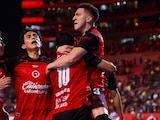 Jugadores de Xolos festejando su gol ante Tigres.