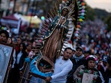 Peregrinos devotos a la Virgen de Guadalupe visitan la Basílica de Guadalupe con motivo del aniversario 493 de la aparición de la virgen en el Cerro del Tepeyac.