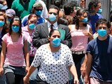 Personas con cubrebocas para prevenirse por contagios del COVID-19.