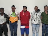 Ministerio del Interior y la Policía ecuatoriana presentan a los detenidos por el atentado electoral, ayer.