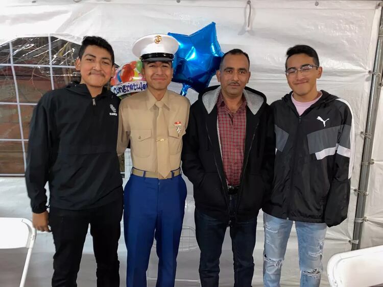 Narciso Barranco y sus tres hijos.