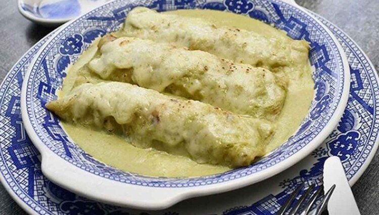 ¿De dónde son originarias las enchiladas suizas y por qué se les llama así?