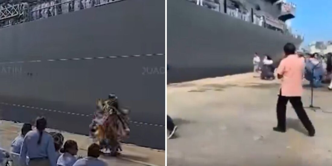 Cae bailarina al agua en ceremonia de despedida de buques japoneses.