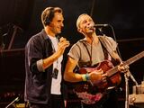 Roger Federer junto a Chris Martin en el concierto de Coldplay en Roma