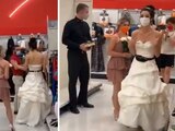 Mujer lleva vestida de novia a buscar a su pareja al trabajo