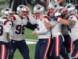 Jugadores de los Patriots festejan un touchdown en su partido contra Jets en la Semana 9 de la NFL.