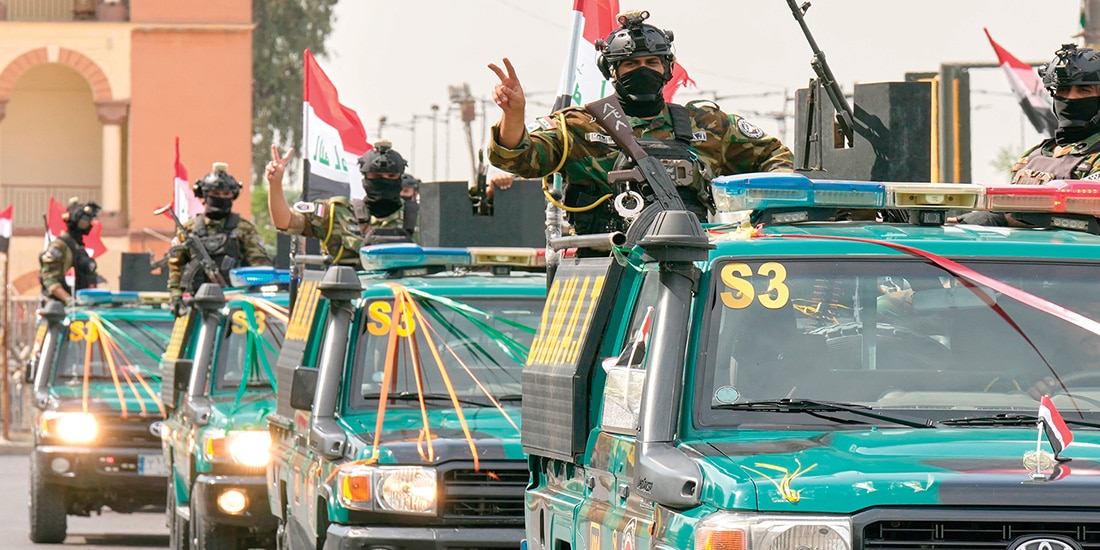 Convoy que celebra la retirada completa de las tropas estadounidenses de Irak, ayer.