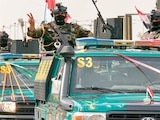 Convoy que celebra la retirada completa de las tropas estadounidenses de Irak, ayer.