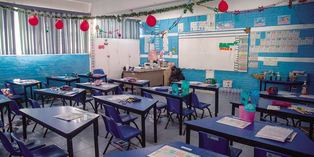 un salón en una escuela de la CDMX, en foto de archivo.