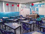 un salón en una escuela de la CDMX, en foto de archivo.